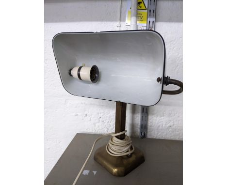 A weighted brass bankers desk light with original green glass shade (chips to front edge of shade)Location: RWBIf there is no