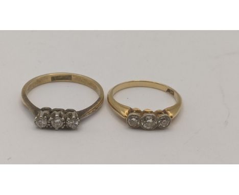 Two three stone ladies diamond rings to include one in a platinum claw setting on an 18ct yellow gold shank, size P, 2.7g,  a