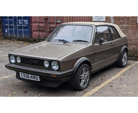 A 1985 Volkswagen Golf MKI GTI Cabriolet - C936 KRO, gold colour 1781cc three door petrol, 168,327 no MOT, three previous own