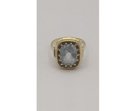A 14ct yellow gold and blue topaz ring, old cushion cut blue topaz in a 14-claw setting, size R 1/2, 5.1g Location:If there i