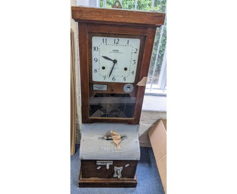 An early/mid 20th century National Time Recorder clocking in clock, 98.5cm h x 36cm wLocation: LAFIf there is no condition re