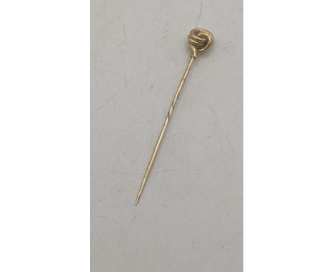 A yellow metal stick pin, pental tested as 18ct yellow gold, pin tested as 14ct yellow gold, total weight 3.2gLocationIf ther