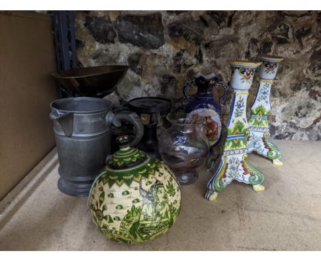 A mixed lot to include a pair of French faience candlesticks, an iron kitchen scales with brass pan, Victorian quart jug, Ind