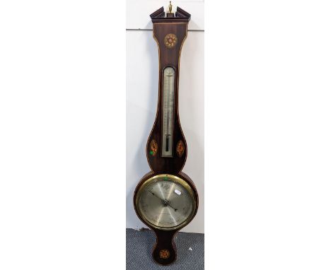 An early 19th century mahogany wheel barometer having marquetry inlaid, a signed silvered dial, 99.5cm h x 35.5cm wLocation: 