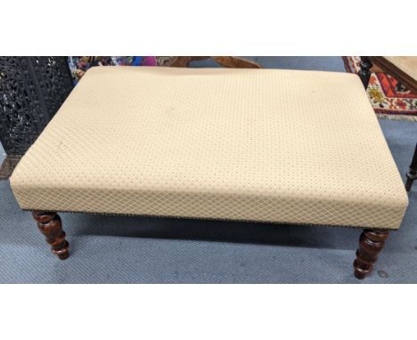 A modern footstool on four turned stained beech legs, 39cm h x 102.5cm wLocation: A2BIf there is no condition report shown, p