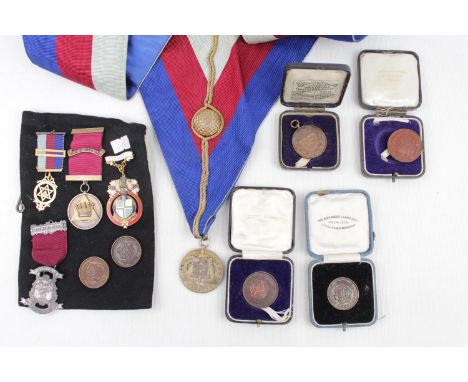 Collection of 4 Masonic Medals, one named to Robert E V Boyanton , Masonic Sash + 4 cased Athletic Medals and 2 named R E V B