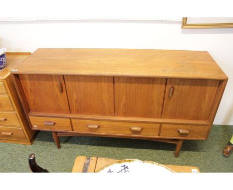 G Plan Teak Sideboard of 2 cantilever doors above 3 drawers with cup handles and tapering squat legs to base 