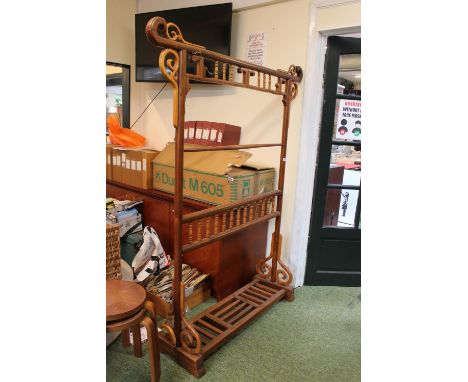 20thC Chinese Valet with turned and scroll decoration. 138cm in Length 