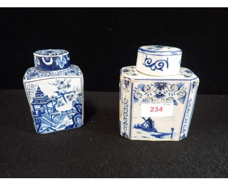 A DELFT TEA CADDY, 11.5cm high and another similar (2)