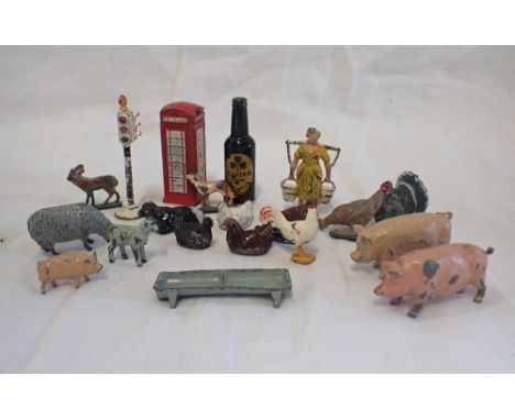 A COLLECTION OF BRITAIN'S CAST METAL ANIMALS and similar and a Vintage Guinness lighter