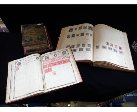 A LARGE EDWARDIAN STAMP ALBUM, 'The century Postage Stamp Album' dated 1908, containing period stamps and a collection of Vin