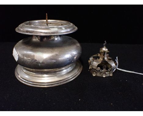 AN ITALIAN SILVER SQUAT CANDLESTICK, with pricket, together with a white metal statue crown (2) 