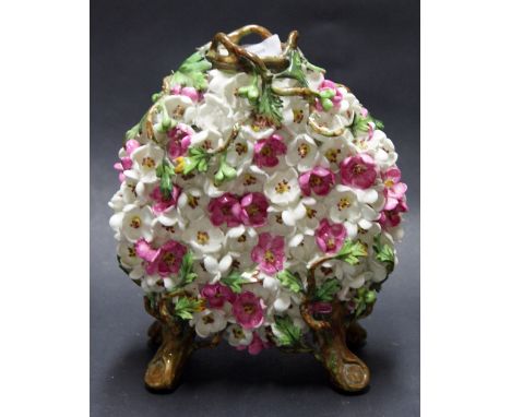 A Majolica-style ceramic flask with applied cherry blossom decoration