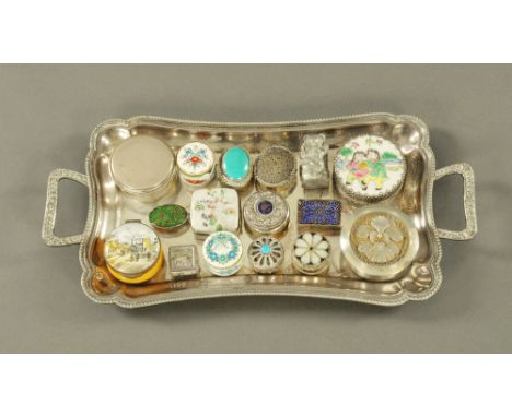 A silver plated tray, together with a quantity of silver and other patch boxes.  Tray length 34 cm.