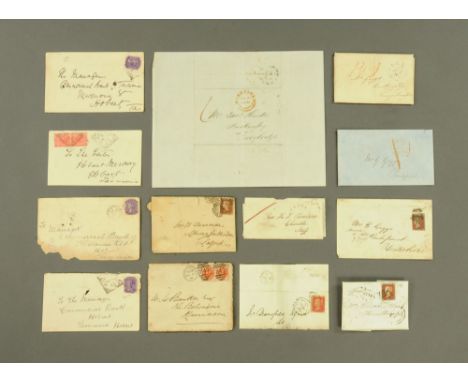 A collection of thirteen Victorian letters with one penny red stamps for the UK, and one penny and twopenny Victorian stamps 