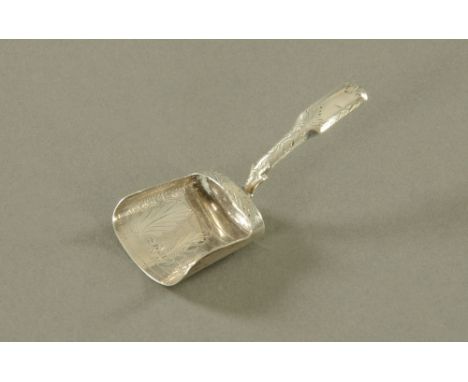 A William IV caddy spoon, Birmingham 1834, maker Thomas Lawrence.  Length 73 mm, 5 grams. CONDITION REPORT: The caddy spoon i