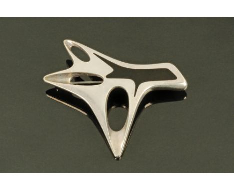 A Georg Jensen silver and black enamel brooch, designed by Henning Koppel, Model No. 323.  6 cm long. CONDITION REPORT: The b