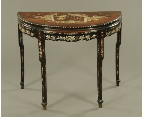 A Chinese hardwood demi lune side table, inlaid with mother of pearl with scroll foliate and character mark decoration.  Rais