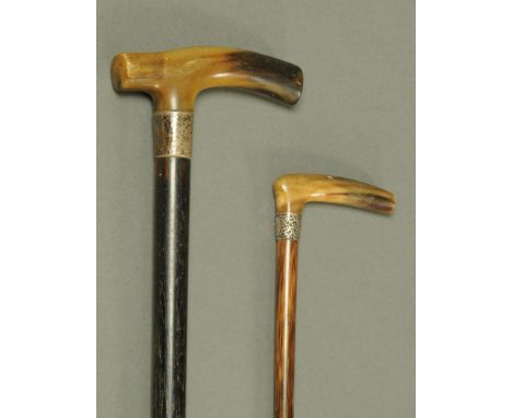 A gentleman's silver mounted horn handled walking stick, and a ladies silver mounted walking cane.