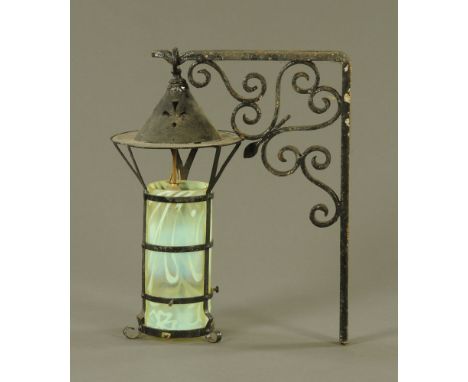 A vintage tin plate hall light fitting of lantern style, together with wrought iron angle bracket.  Light fitting height 46 c