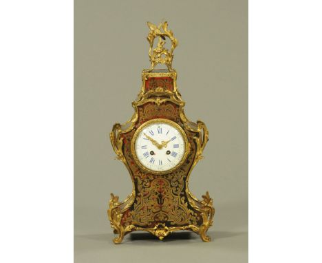 A 19th century French Boulle marquetry mantle clock, with gilt metal mounts with two train striking movement and enamelled di