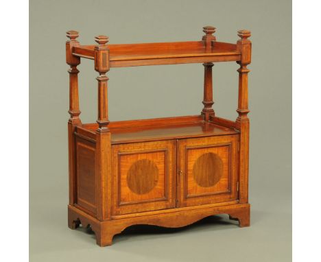 An Edwardian inlaid mahogany dumb waiter, two tiers with cupboards beneath and raised on bracket feet.  Height 111 cm, width 