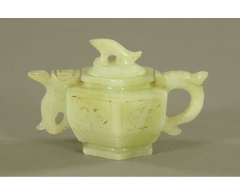 A Chinese jade hexagonal teapot, with incised decoration.  Height 9.5 cm, length 14.5 cm.