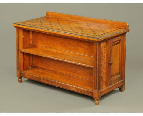 A Victorian walnut and ebony leaf holder and combined open buffet table, in the aesthetic style with cupboard to right hand s