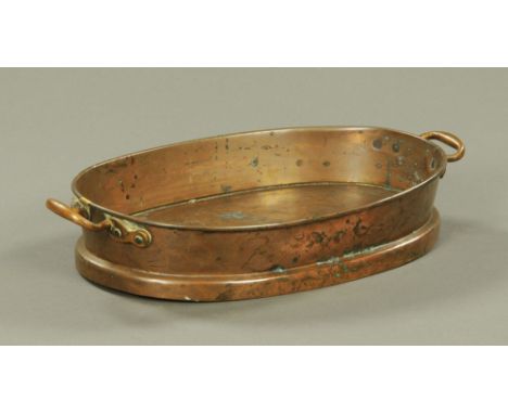 A Victorian copper oval planter.  Length excluding carrying handles 48 cm.