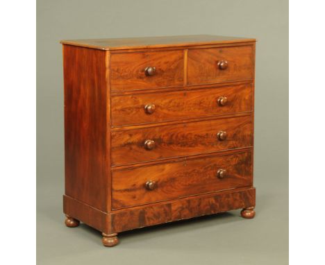 A Victorian figured mahogany chest of drawers, on bun feet.  112 cm high, 108 cm wide, 54 cm deep. CONDITION REPORT: The ches