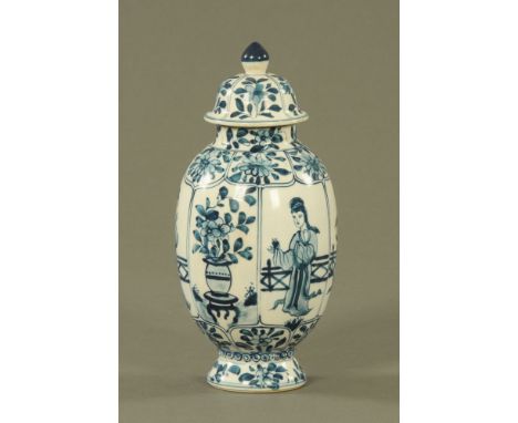 A Chinese blue and white porcelain bulbous lidded tea caddy, of Kangxi style, decorated in panels with "Long Eliza" and flowe