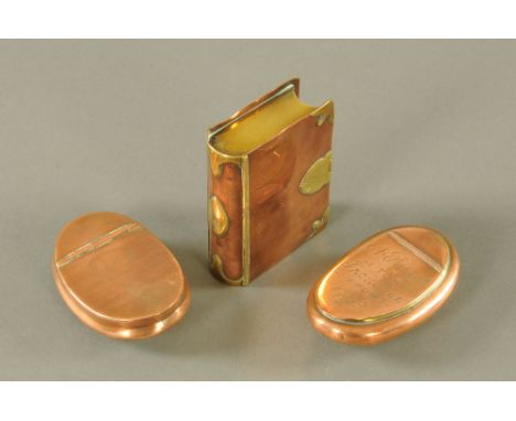 An antique copper book shaped snuff box, with brass bindings and two others.  Largest 8.5 cm x 6.5 cm. CONDITION REPORT: thre