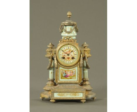 A 19th century French gilt metal and porcelain mantle clock, with two train striking movement.  Height 39 cm, width 23 cm.