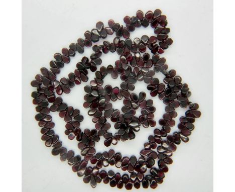 An opera-length necklace of polished amethyst, closed L: 50 cm. UK P&amp;P Group 0 (£6+VAT for the first lot and £1+VAT for s