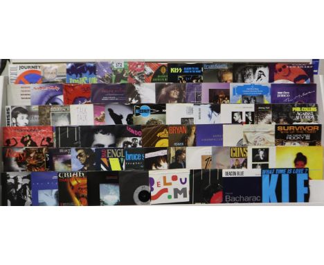 Approximately 60 singles, mostly rock, including Kiss, Journey, Phil Collins etc. UK P&amp;P Group 2 (£20+VAT for the first l