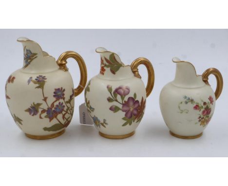 Royal Worcester set of three graduated flat-back jugs, each painted and gilt against a blush ivory ground, largest H:18cm, no