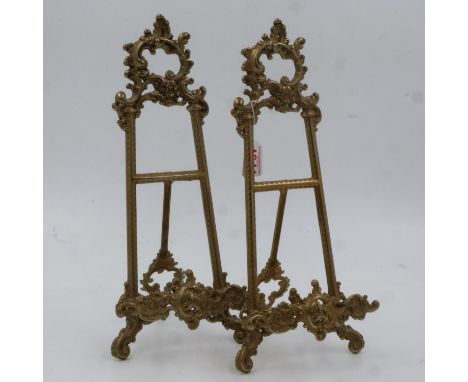 A pair of large brass rococo style table easels each H:39cm. UK P&amp;P Group 2 (£20+VAT for the first lot and £4+VAT for sub