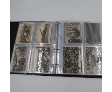 Postcard album containing approximately 200 WWI military postcards including some Aircraft examples. UK P&amp;P Group 2 (£20+