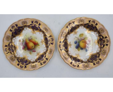 Albert Shuck for Royal Worcester pair of painted and gilt cabinet plates, D: 23 cm, large crack down one plate. UK P&amp;P Gr