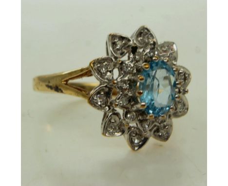 9ct gold blue topaz and diamond set cocktail ring, size O, 3.6g. UK P&amp;P Group 0 (£6+VAT for the first lot and £1+VAT for 