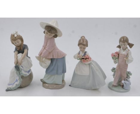 Lladro: four figurines, one boxed, largest H:23cm, no visible damages or repairs. UK P&amp;P Group 3 (£30+VAT for the first l