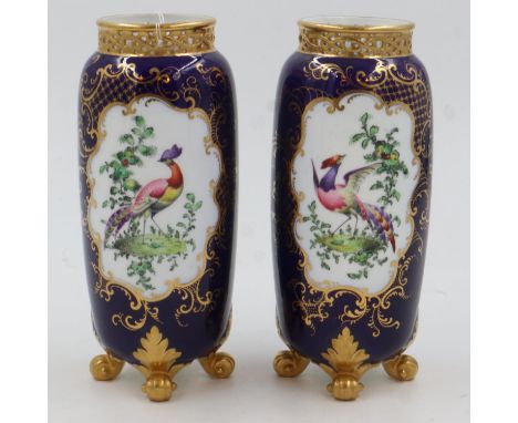 George Grainger Worcester pair of garniture vases each decorated with a bird of paradise and gilt against a cobalt blue backg