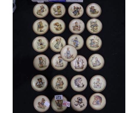 A set of twenty five MJ Hummel Goebel miniature annual plates, each D:80mm, all boxed, no visible damages or repairs.  UK P&a