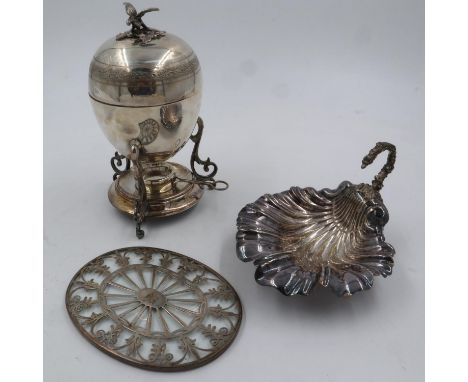 A hallmarked silver bound glass trivet, silver plated egg coddler, and a silver plated leaf form dish (3). UK P&amp;P Group 2