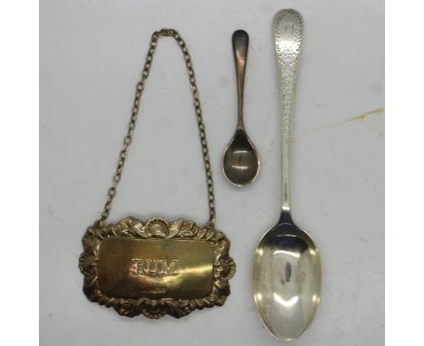 Two hallmarked silver spoons and a silver Rum decanter label. UK P&amp;P Group 1 (£16+VAT for the first lot and £2+VAT for su