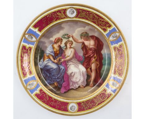 Vienna porcelain cabinet plate decorated with a figural scene and heavily gilt, D:24cm, no visible damages or cracks. UK P&am