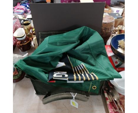 Vintage canvas carry bag and Magners Cider advertising sign