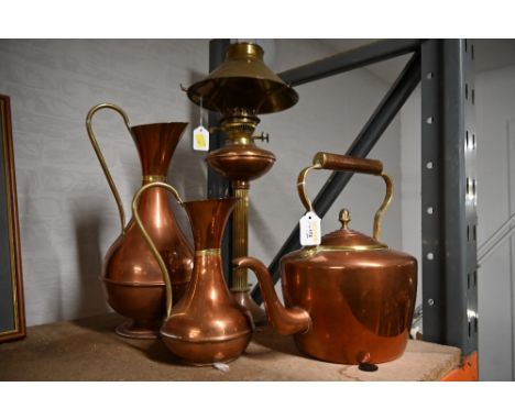 Copper oil lamp, 2 ewers and copper kettle  