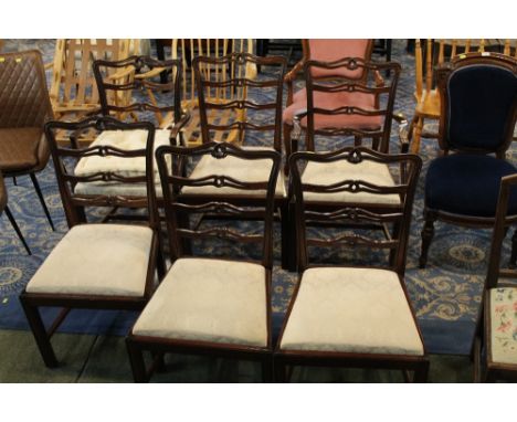 Six Victorian style mahogany dining chairs with ladder backs and cream foliate drop in seats