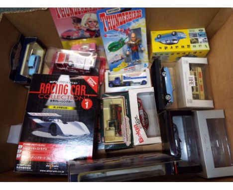 Diecast - A quantity of 14 diecast model motor vehicles to include, Exclusive First Editions, del Prado Japan "Racing Car Col